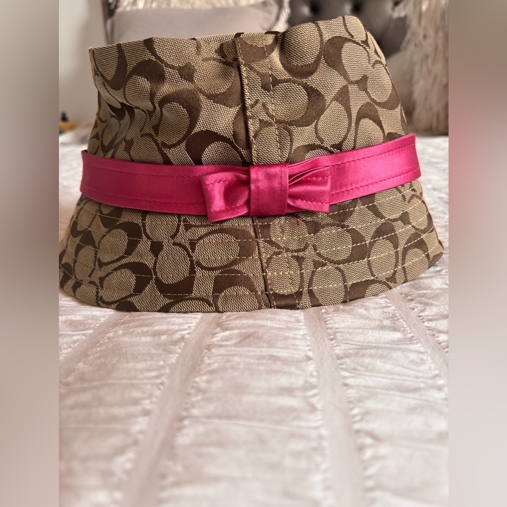 Coach Brown Patterned Hat with Pink Ribbon